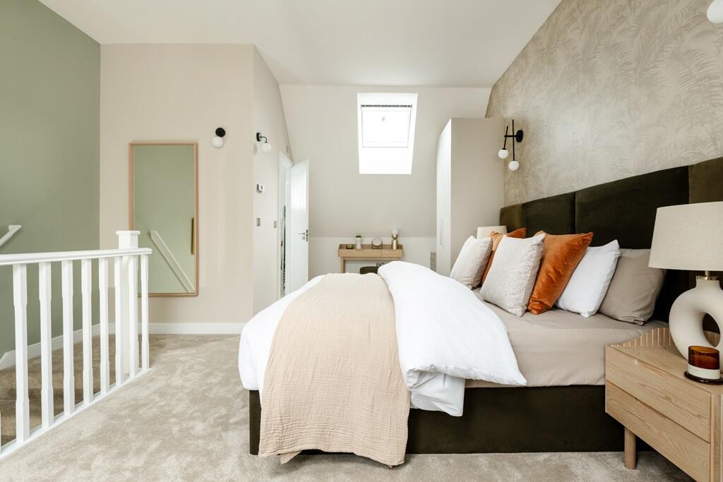 Featuring an open staircase and en-suite shower room