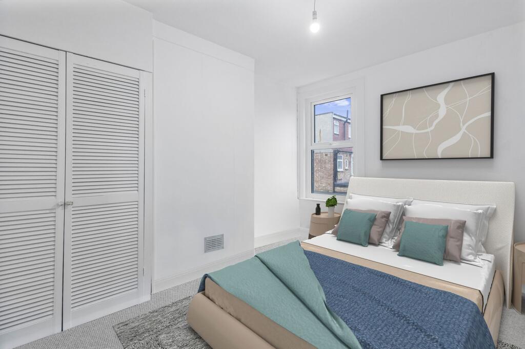 Disclaimer: This image has been virtually staged to illustrate potential layout and furnishings.