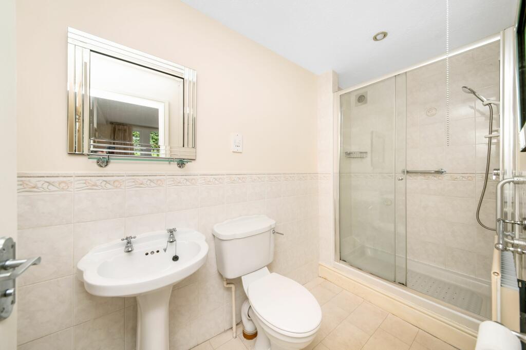 BEDROOM ONE EN-SUITE SHOWER ROOM