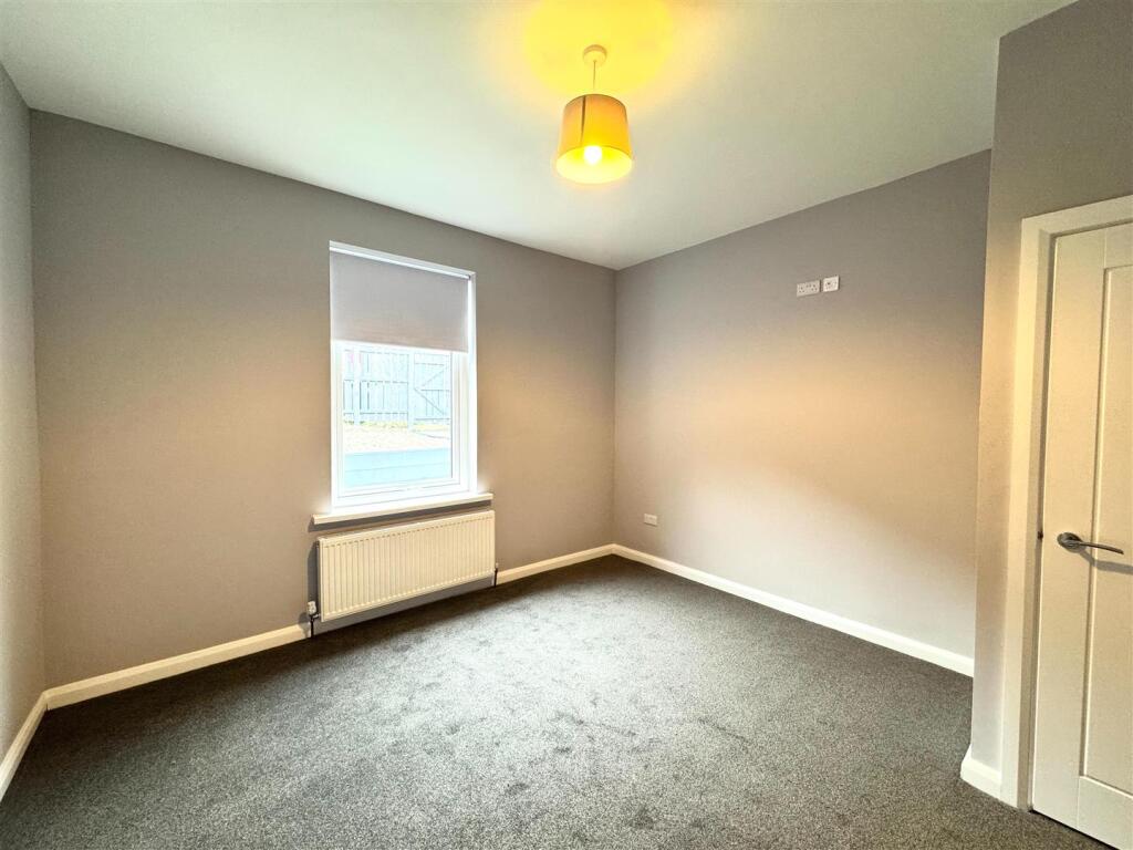 LIVING ROOM/BEDROOM ONE