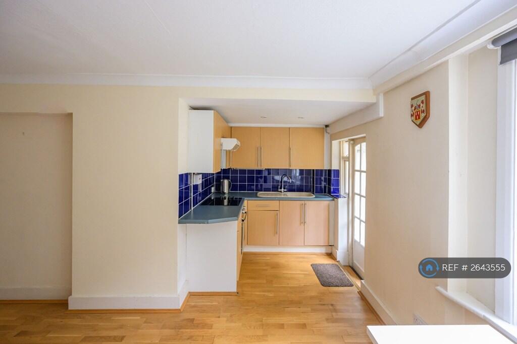 Open Plan Sitting Room With Kitchen