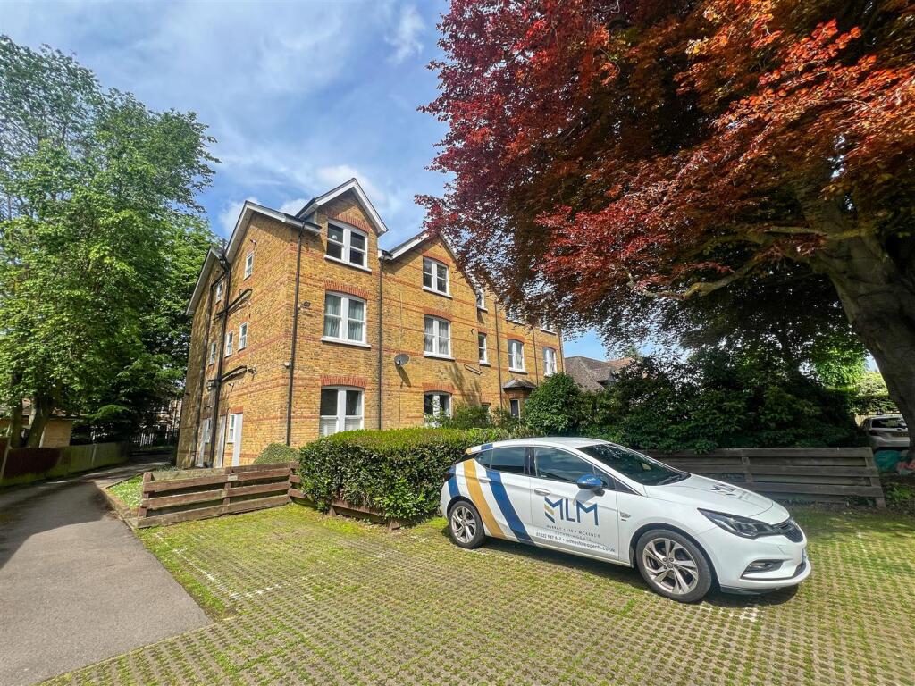 REAR OF BLOCK WITH ALLOCATED PARKING