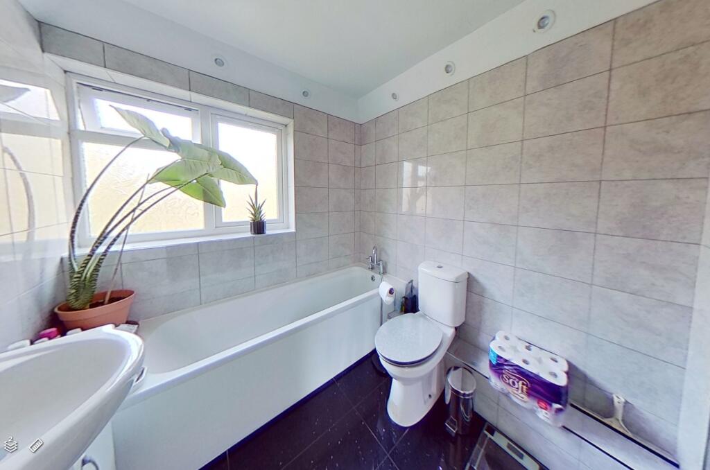 Bathroom with seperate shower cubicle