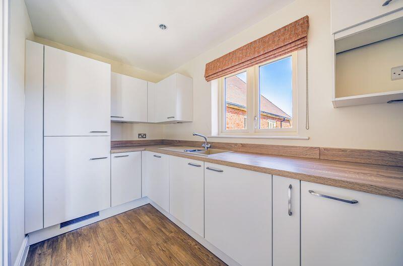 Kitchen with built-in appliances