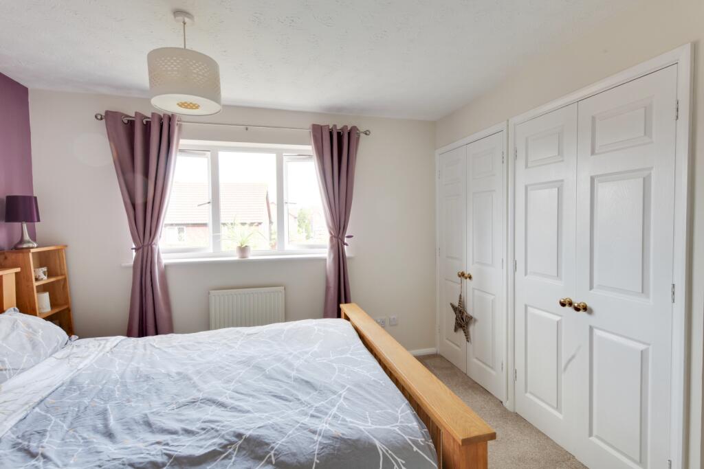 Rear window and fitted wardrobes