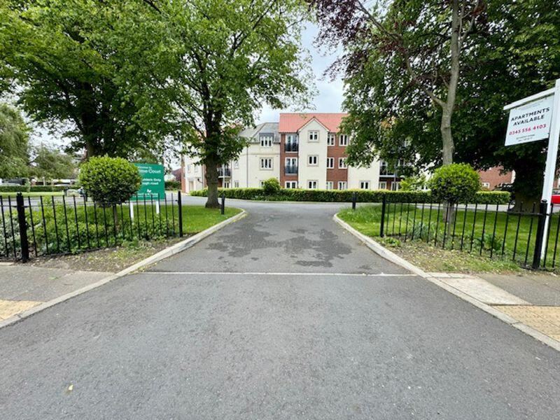 Vehicle entrance to site