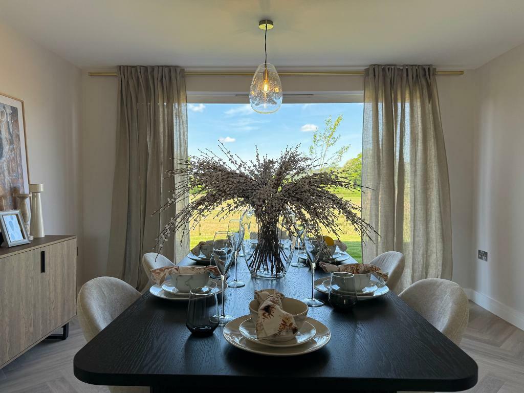 Tranquil dining room with field views