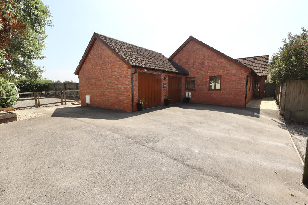 Double garage and parking