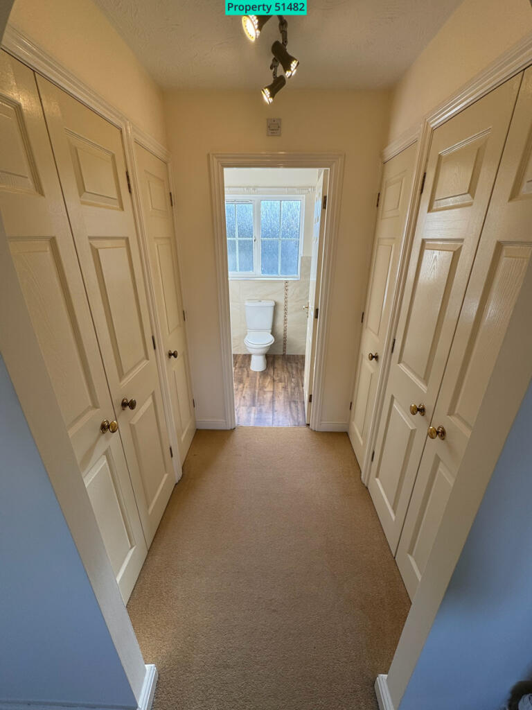 Landing area showing cupboard space