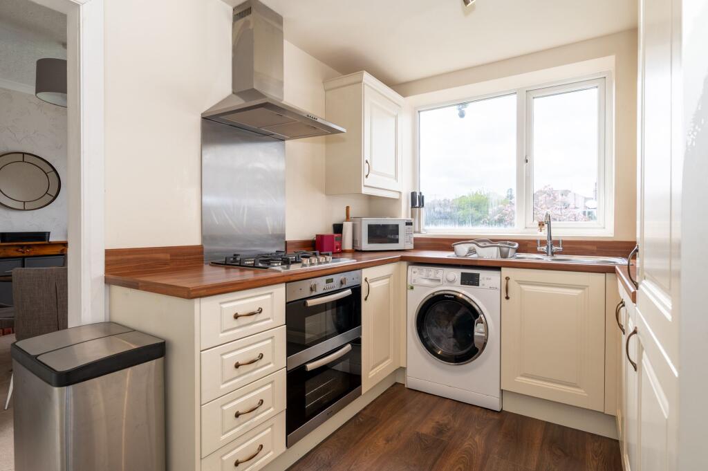 KITCHEN, DINER AND LIVING ROOM