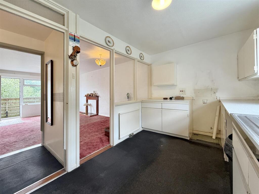 Kitchen To Dining Area.JPG