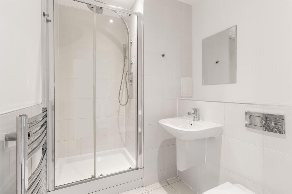 Experience luxury in every detail with this elegantly designed bathroom.