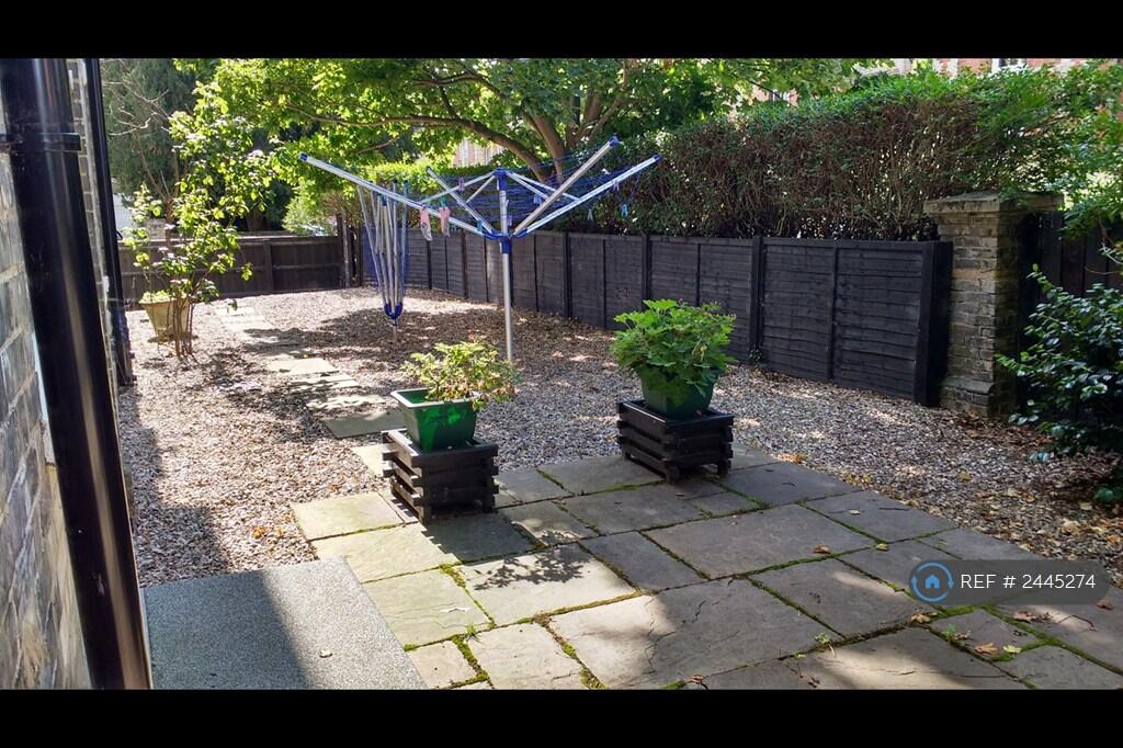 Washing Dryers In Secluded Side Garden