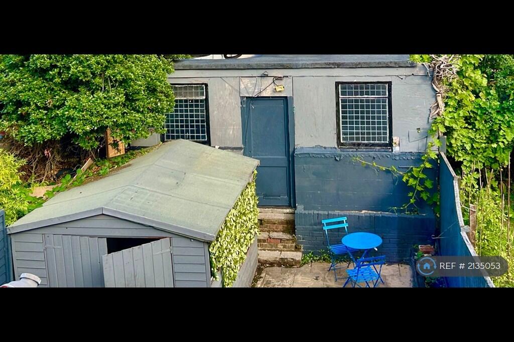 View From Back Bedroom Of Garage And Shed