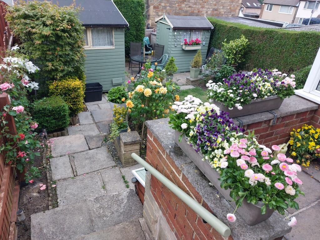 Rear garden in bloom (photo supplied by the vendor)