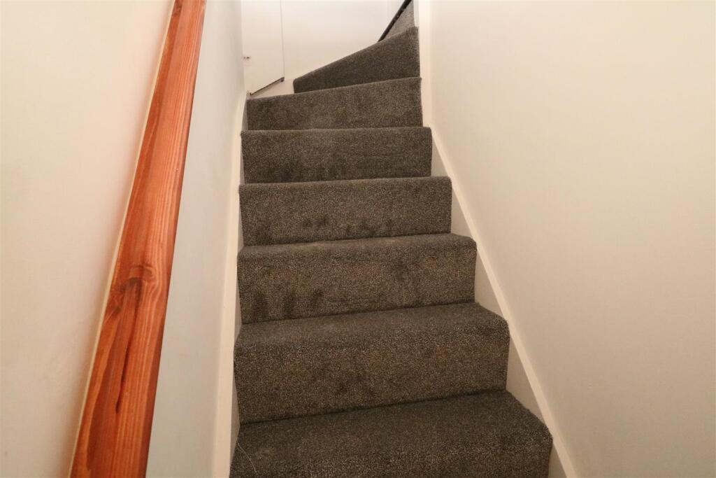 STAIRS TO LOWER GROUND FLOOR LOBBY