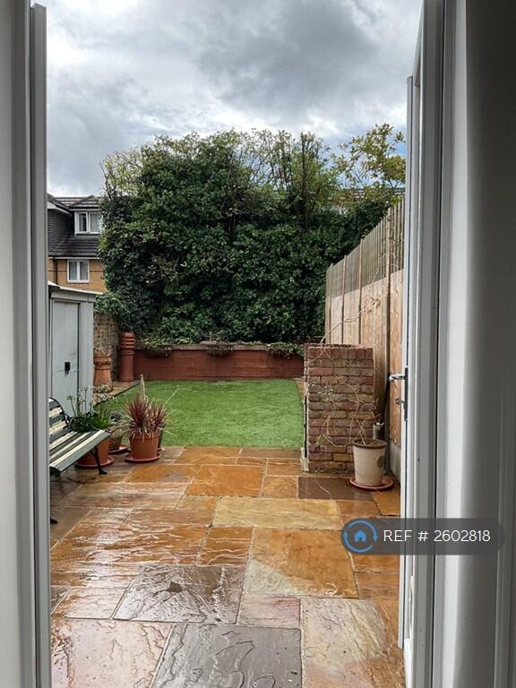 French Doors From Kitchen Leading To The Garden