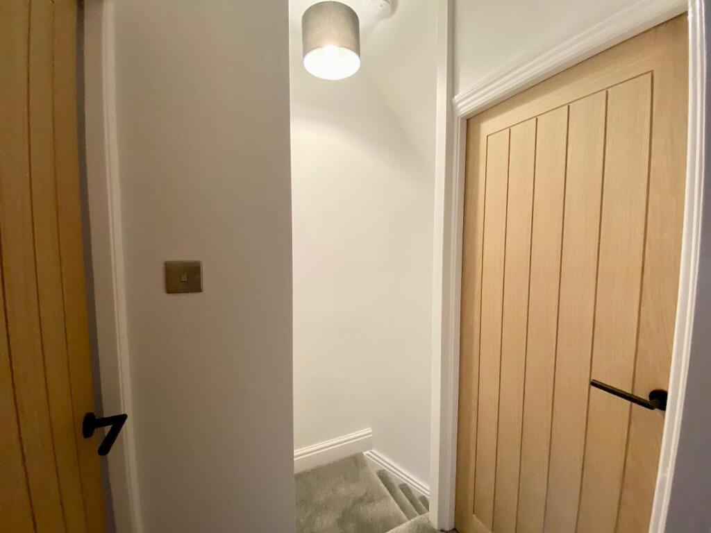 TO THE FIRST FLOOR LANDING
