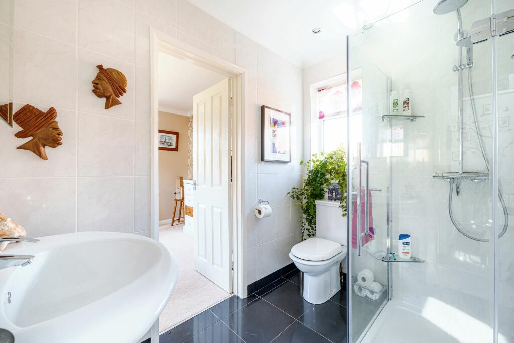 Bedroom three en-suite and family shower room