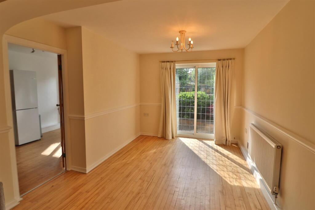 OPEN PLAN LIVING AND DINING ROOM