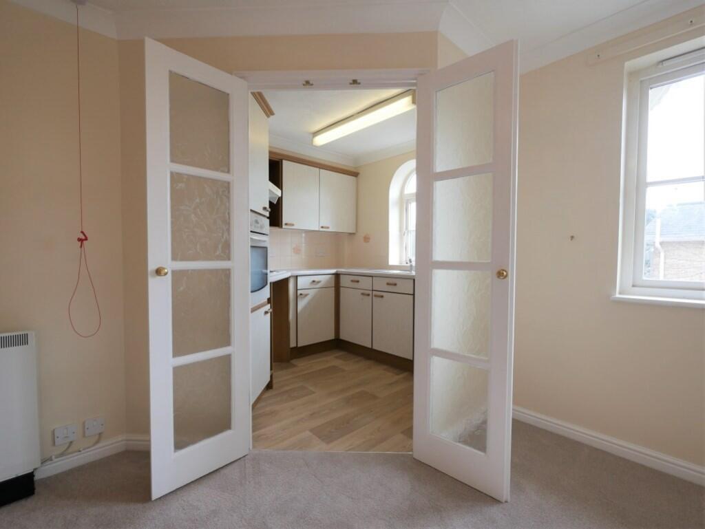 OPENING TO KITCHE...