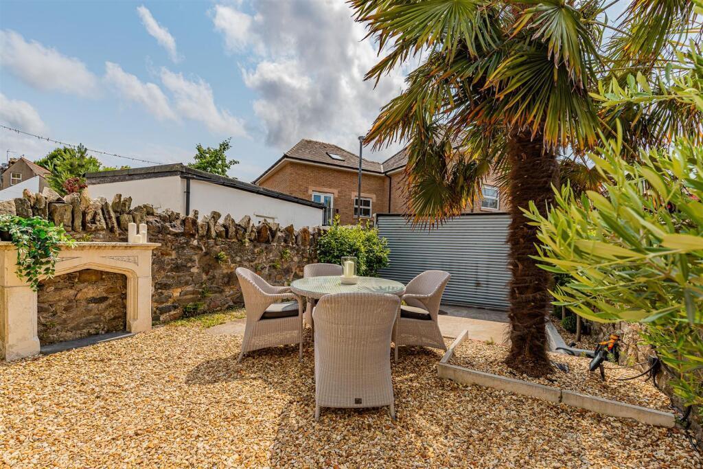 Garden at rear of property with allocated parking