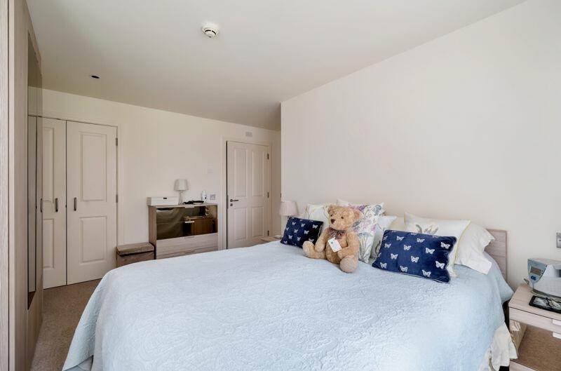 Master bedroom with dressing room and...