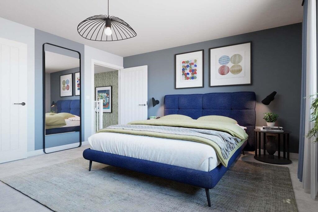 A second double bedroom benefits from an ensuite bathroom
