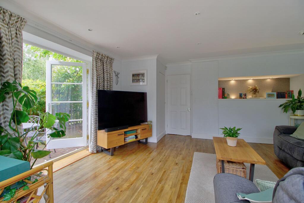 Alcove feature and French doors to side terrace