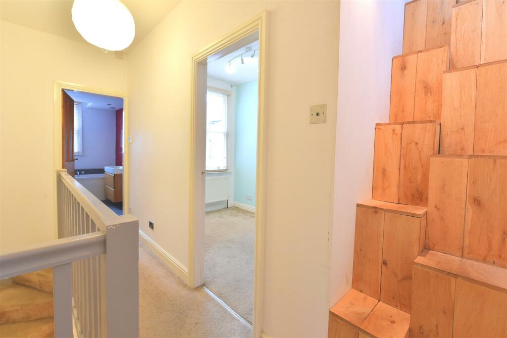 Landing with loft access steps
