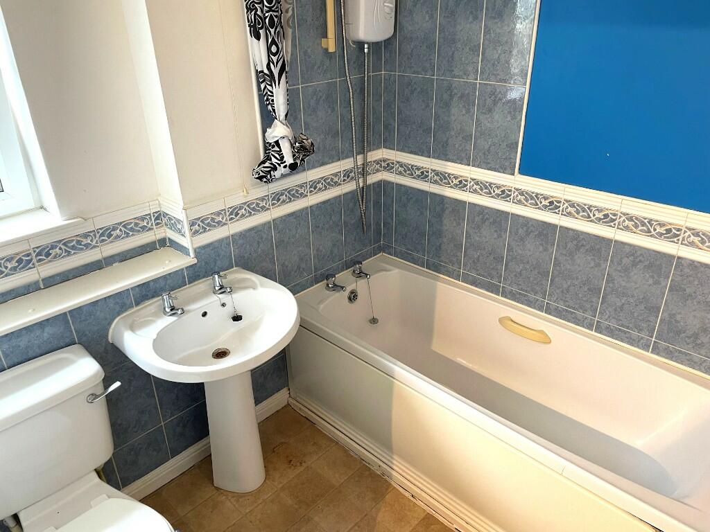 Bathroom 2.3m x 2.1m