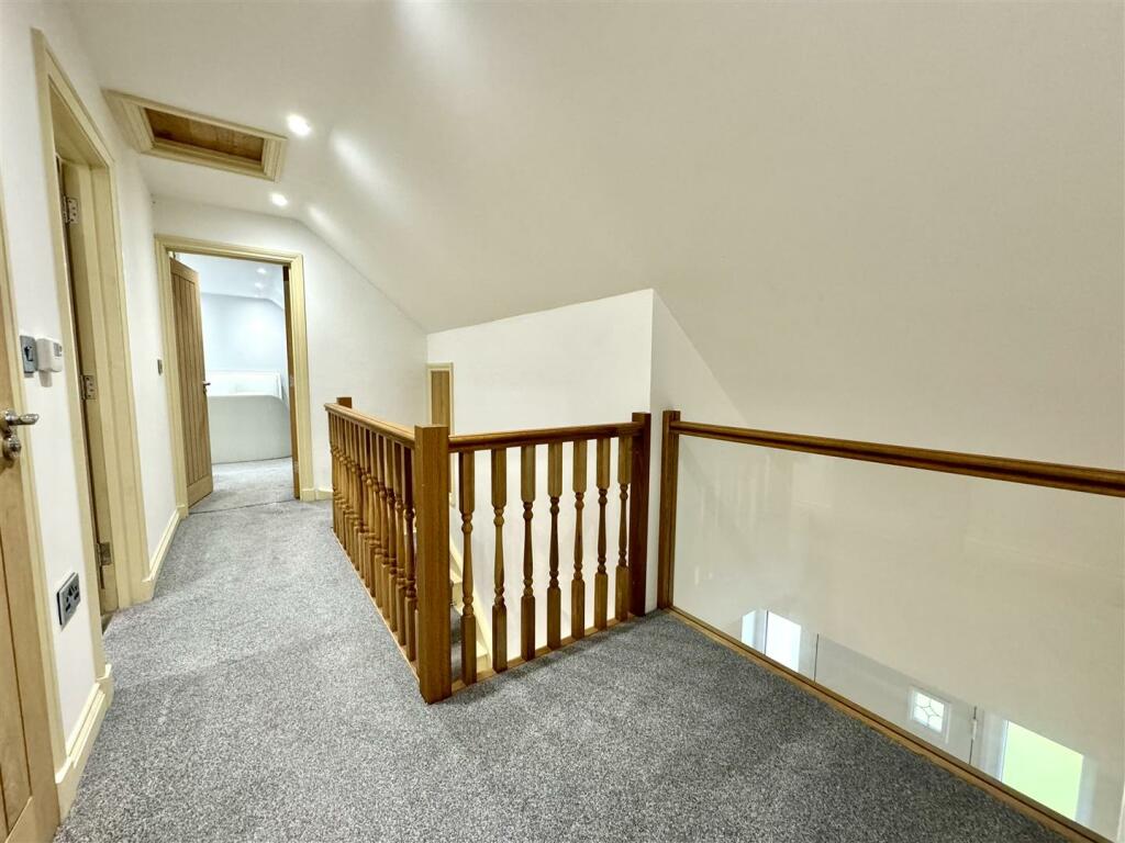 FIRST FLOOR STAIRS AND LANDING