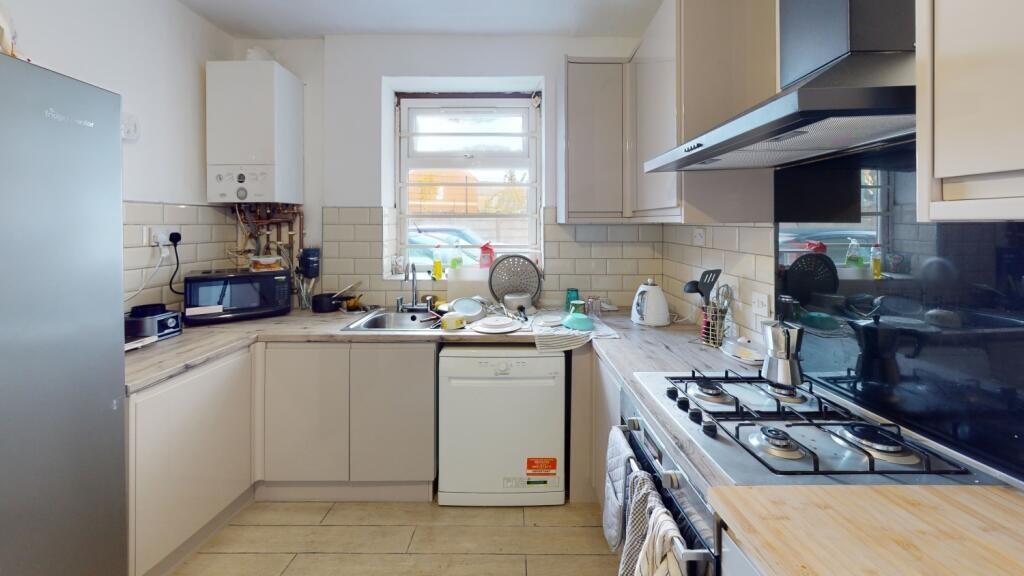 Bright and clean kitchen with modern appliances...