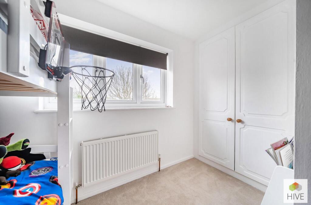 Bedroom two with fitted wardrobe