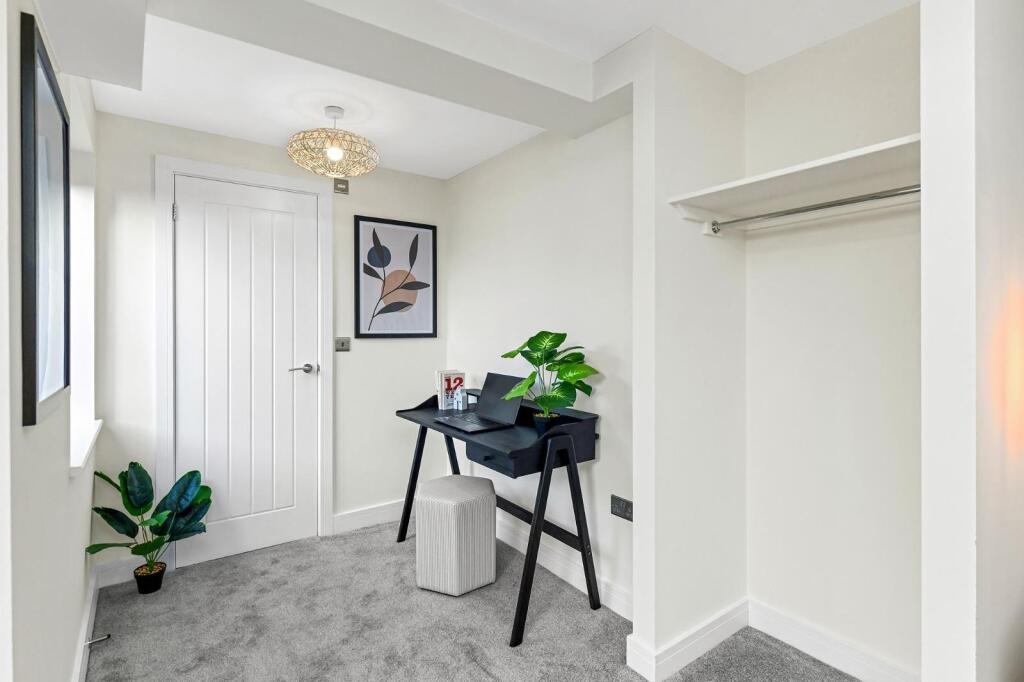 A stylish communal workspace featuring a sleek ...