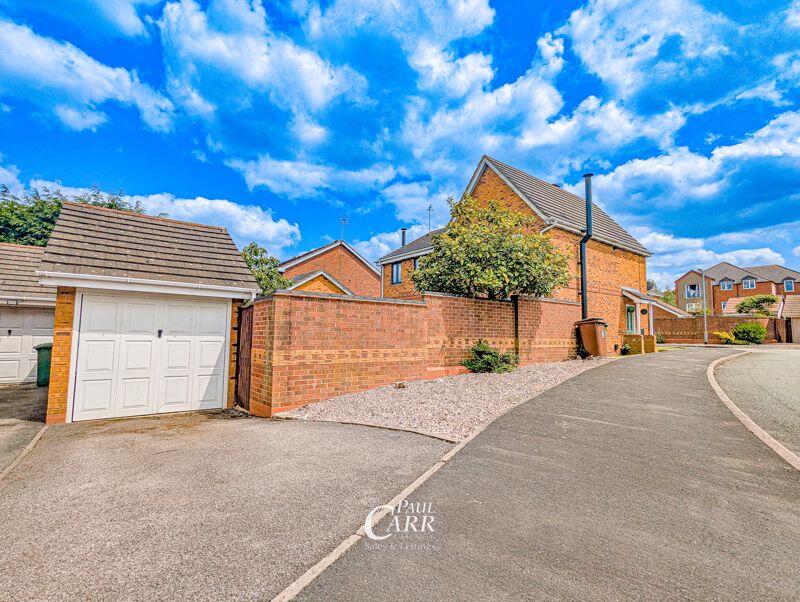 Private Driveway + Garage