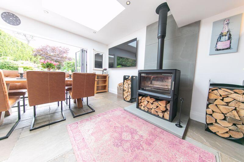 Feature log burning stove