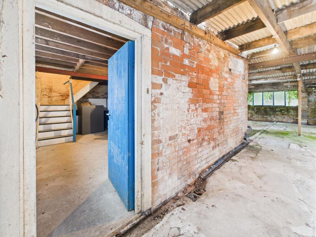 Garage Entrance through to Inner Hallway