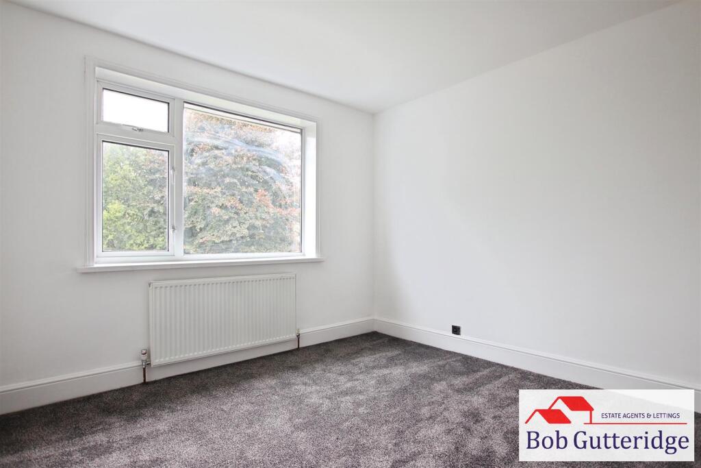 BEDROOM ONE (REAR)
