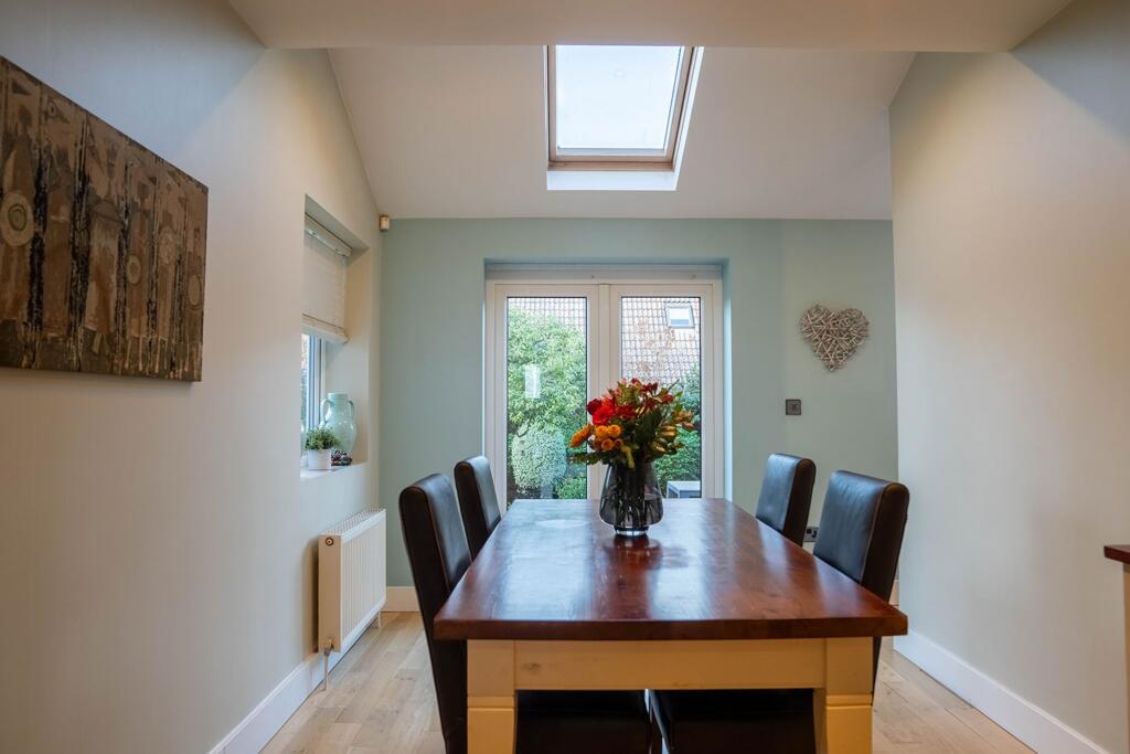 Separate dining space flowing from the kitchen