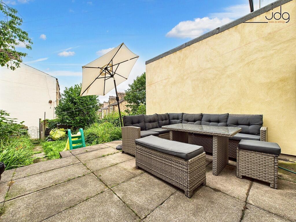 Rear Garden with flagged seating area