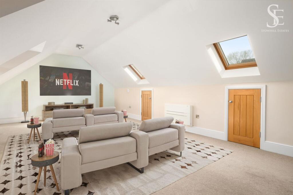Cinema Room (digital image of room above garage - alternative use)
