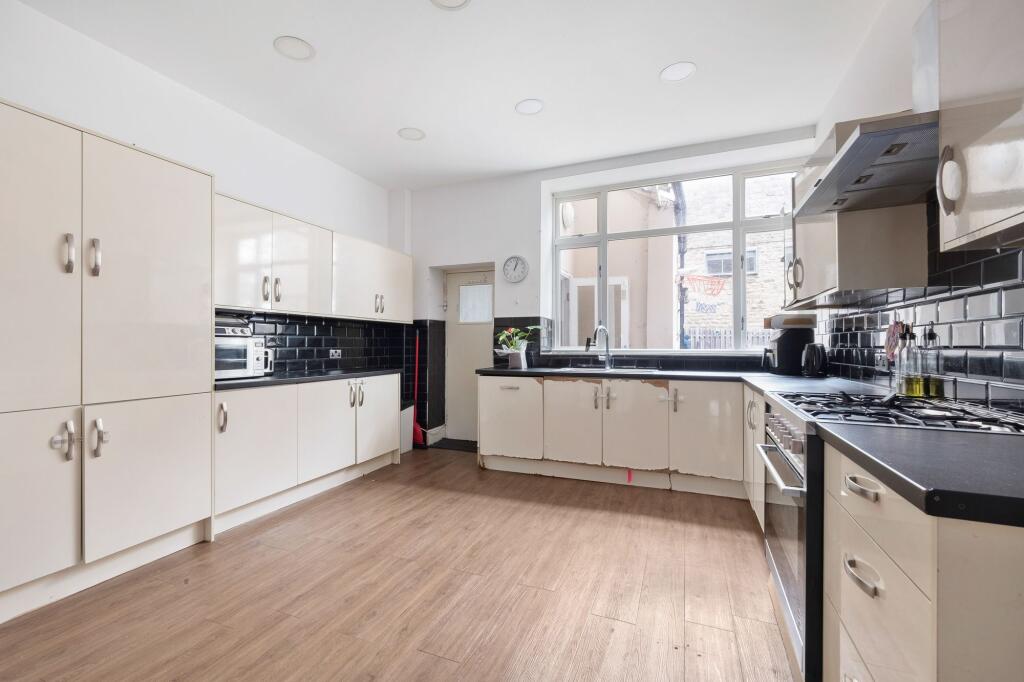 KITCHEN, LIVING ROOM, FAMILY ROOM AND DINING ROOM