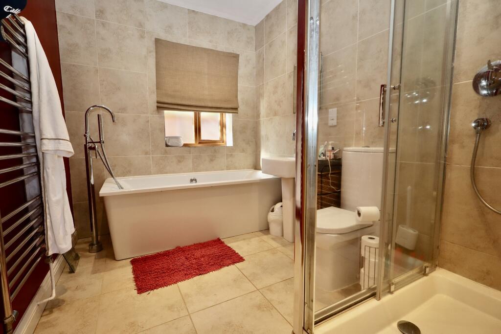 Bathroom with separate shower