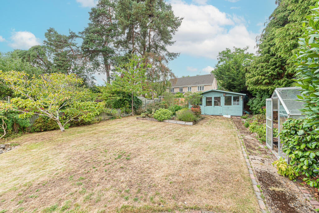 Garden with summer house, greenhouse and garage