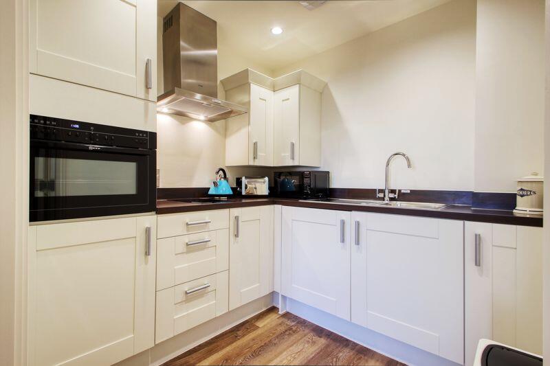 Kitchen with built-in appliances