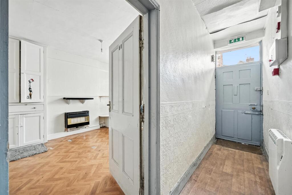 Entrance Hallway and Sitting Room.jpg