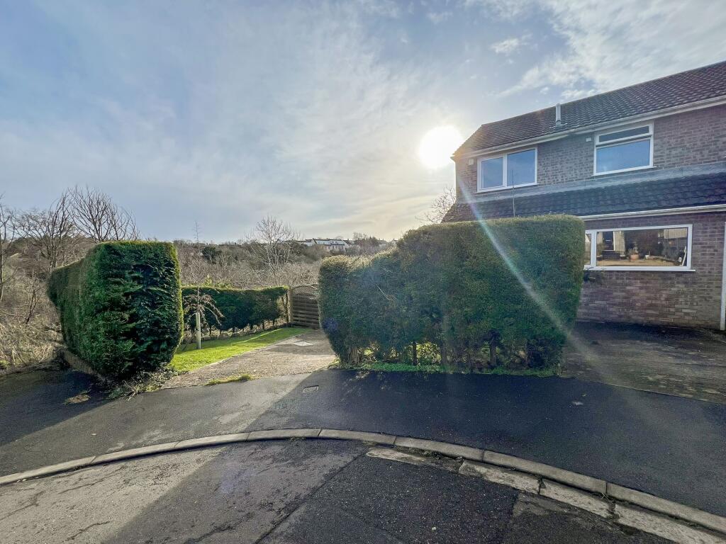 House Front with 2x Driveways
