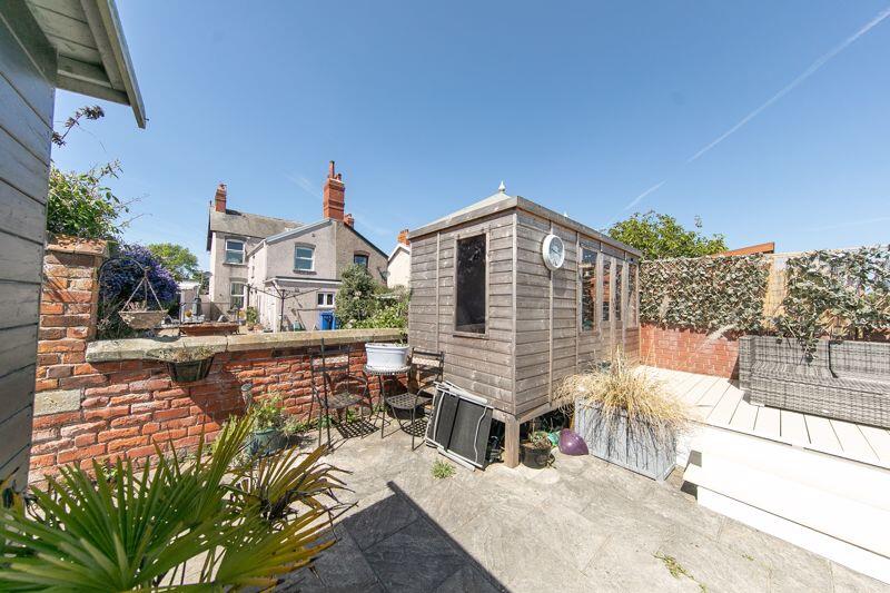 Garden rear summer house and sun deck