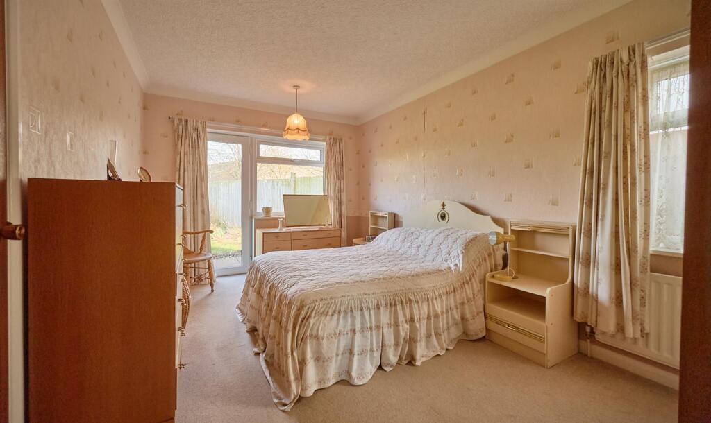 BEDROOM ONE TO REAR
